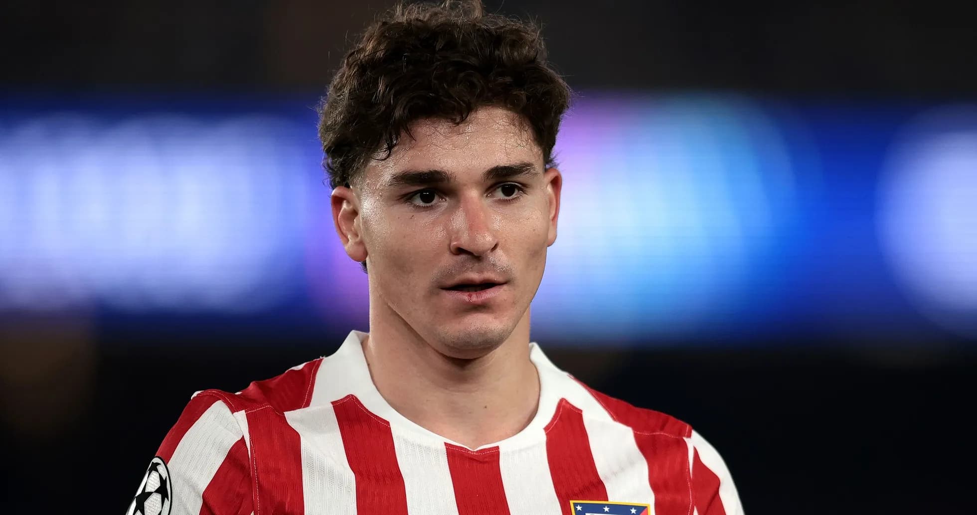 Player in Atlético Madrid jersey during match
