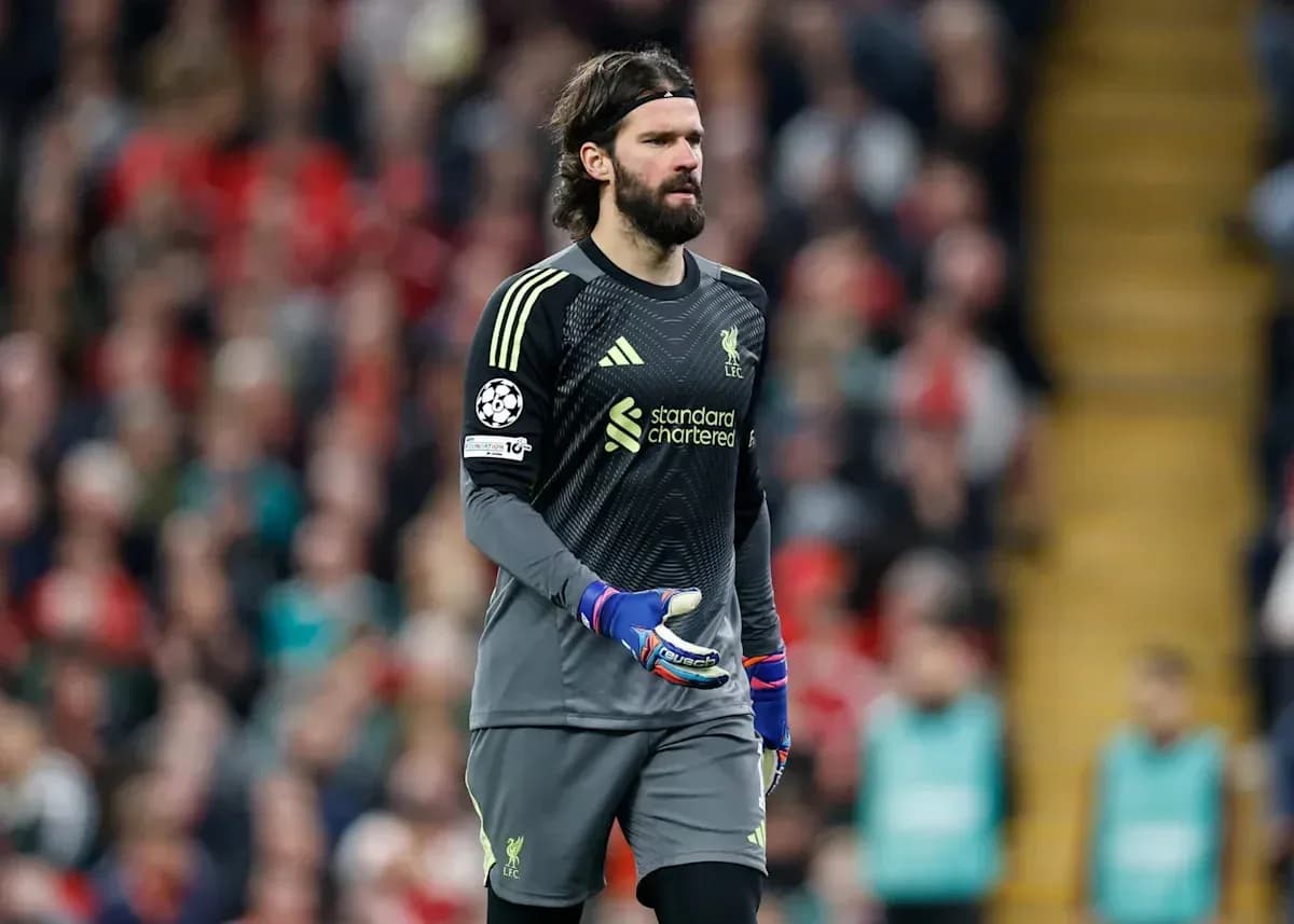 Goalkeeper Alisson Becker walking during a match