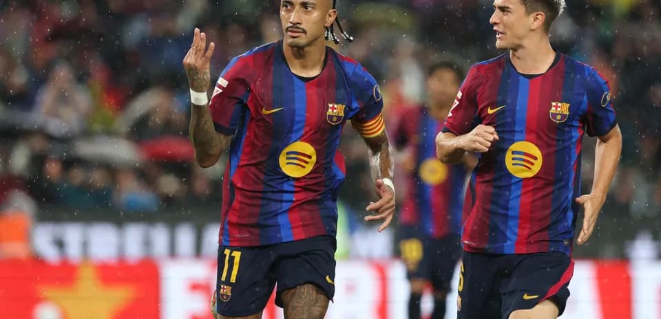 Barcelona players celebrating a goal during match