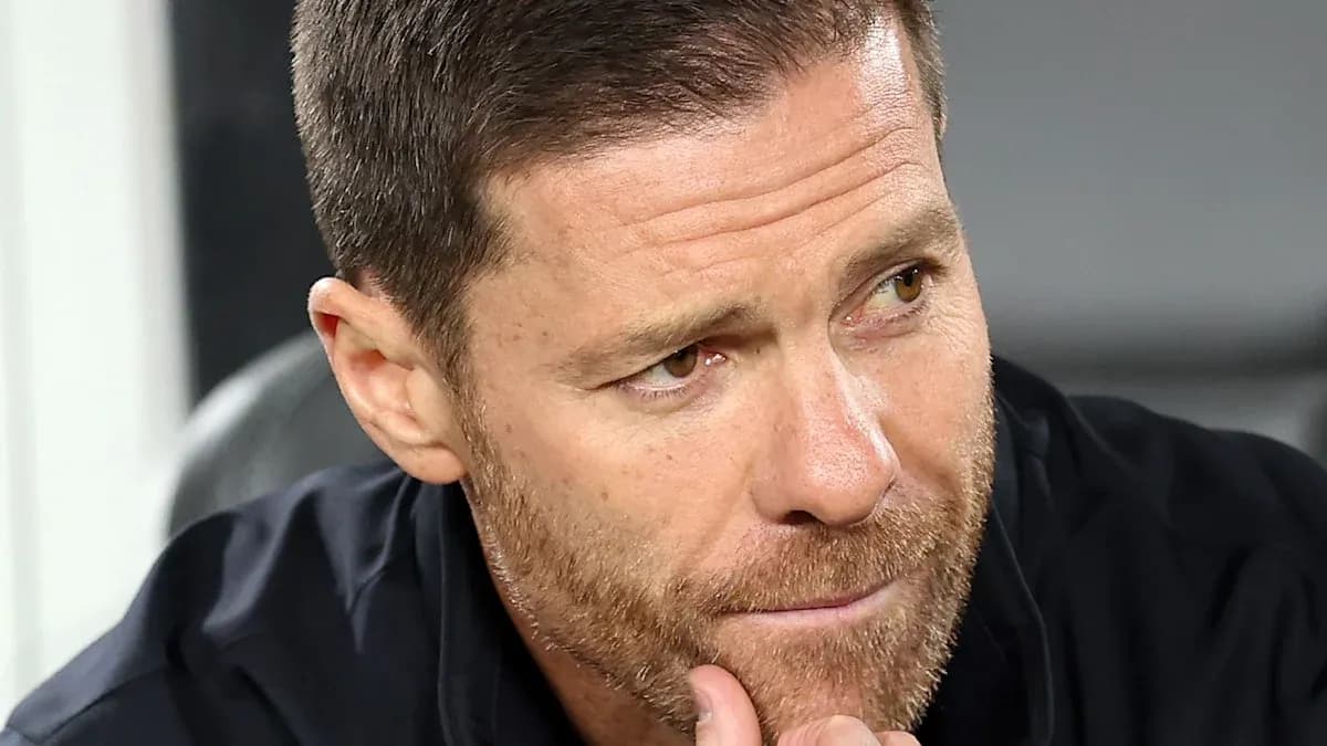 Coach observing the match from the sidelines