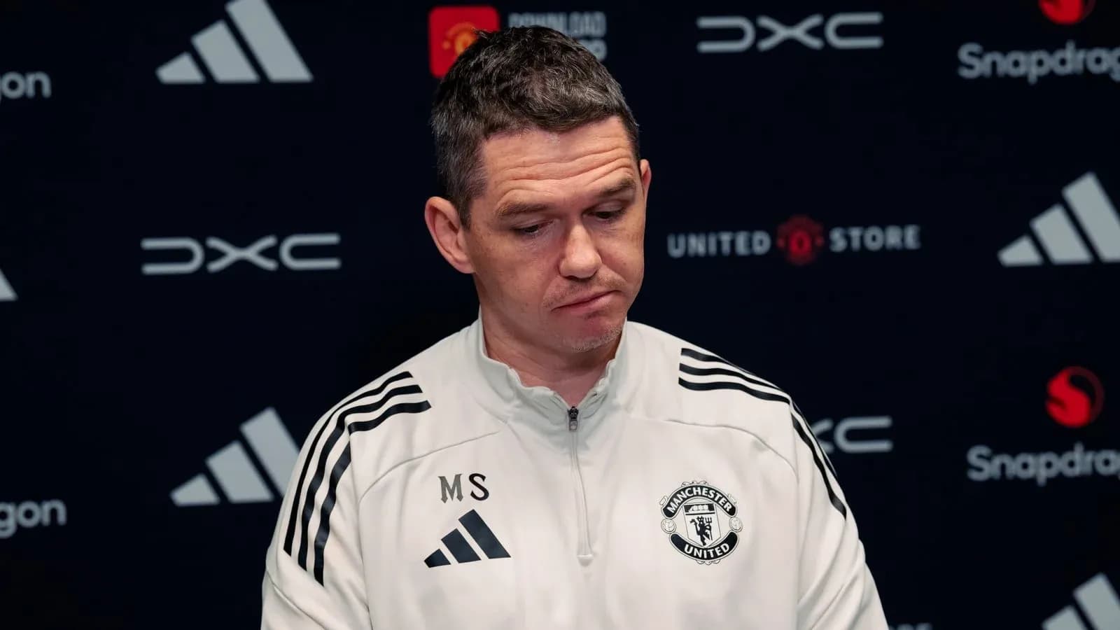 Manchester United coach speaking at press conference