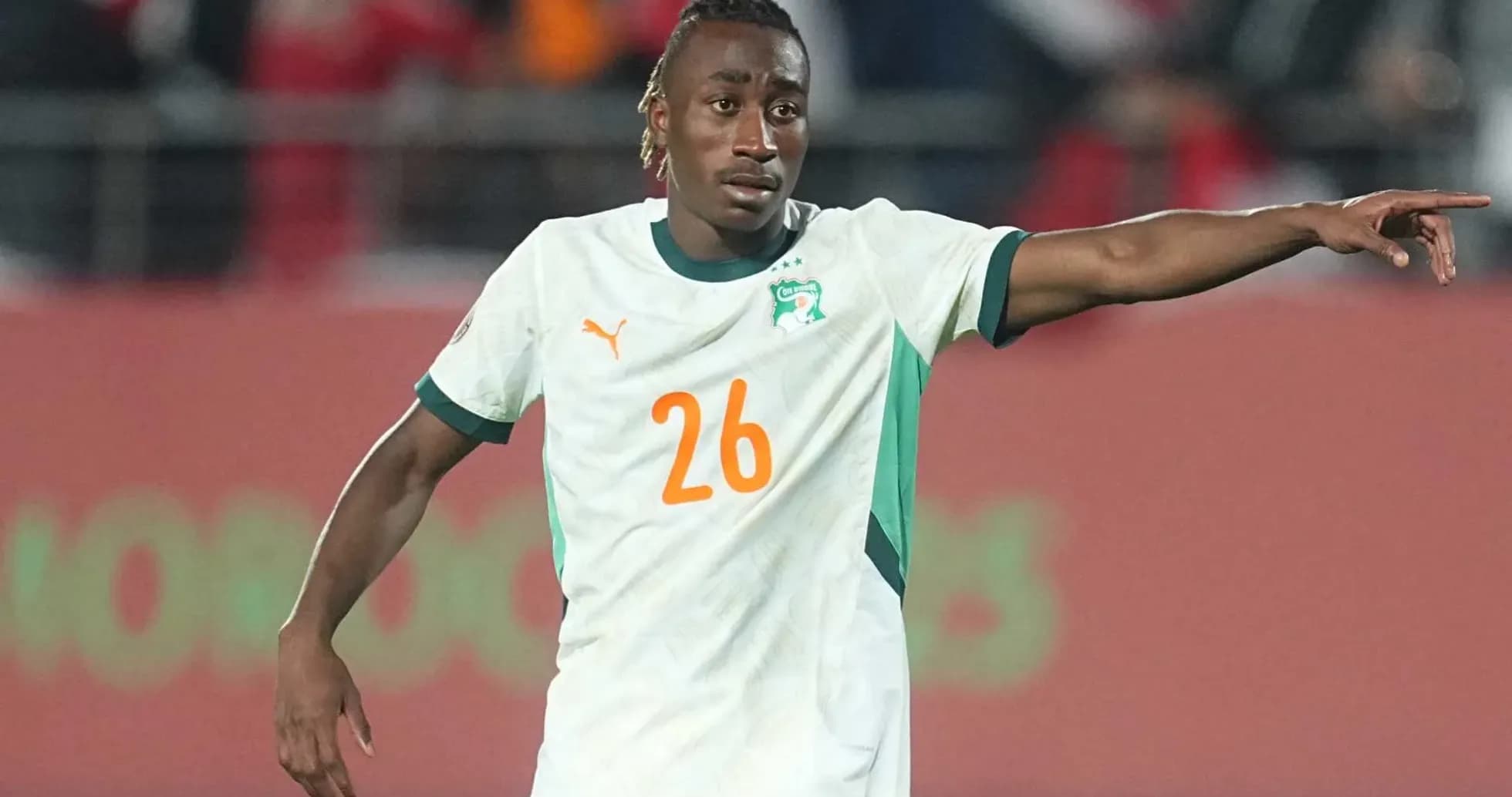 Player 26 from Ivory Coast directing teammates on field