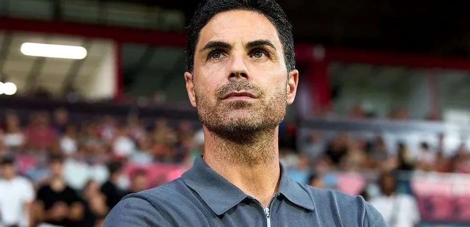 Coach observing the match from the sidelines