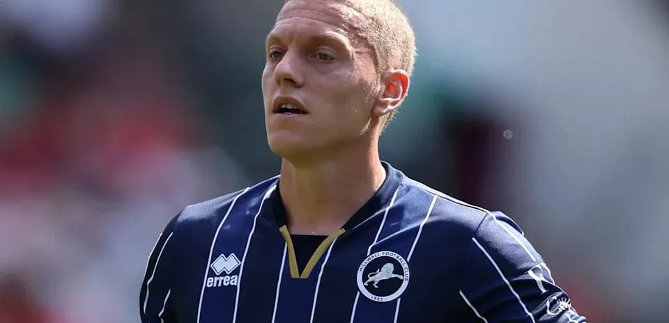 Player wearing Millwall FC jersey during match