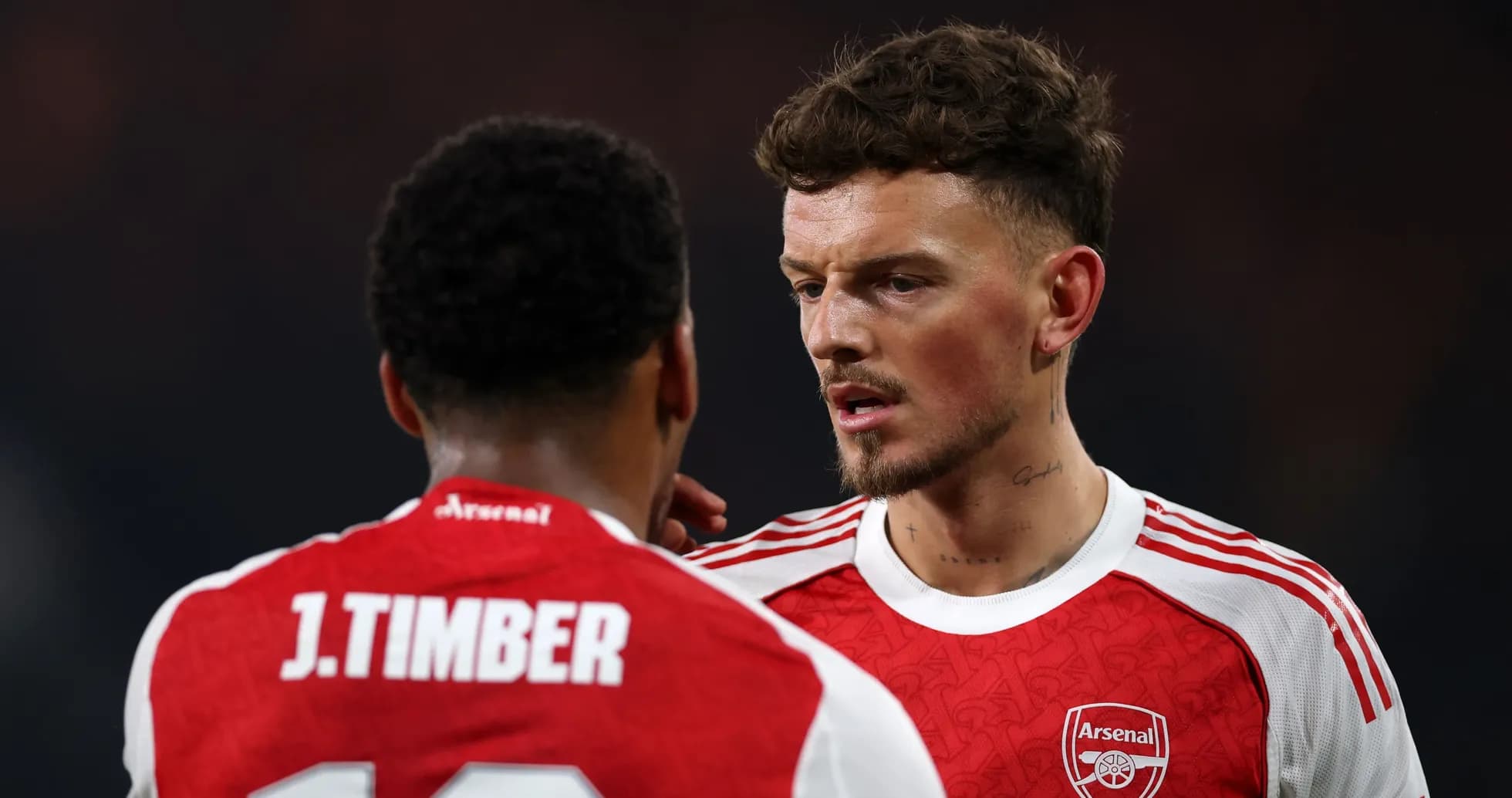 Two Arsenal players discussing during match