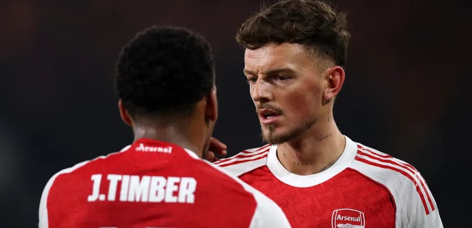 Two Arsenal players discussing during match