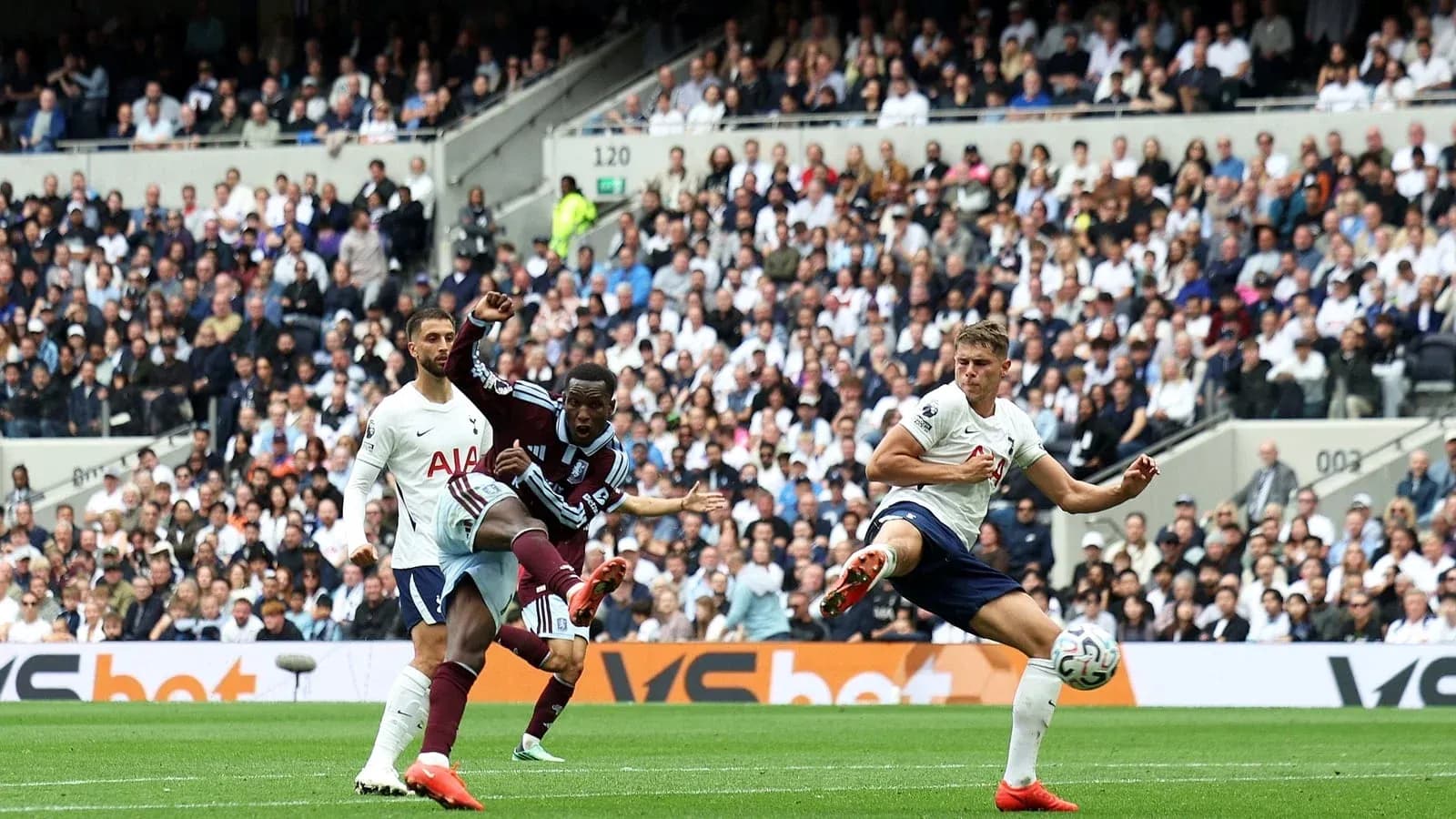 Player kicking the ball during Tottenham match