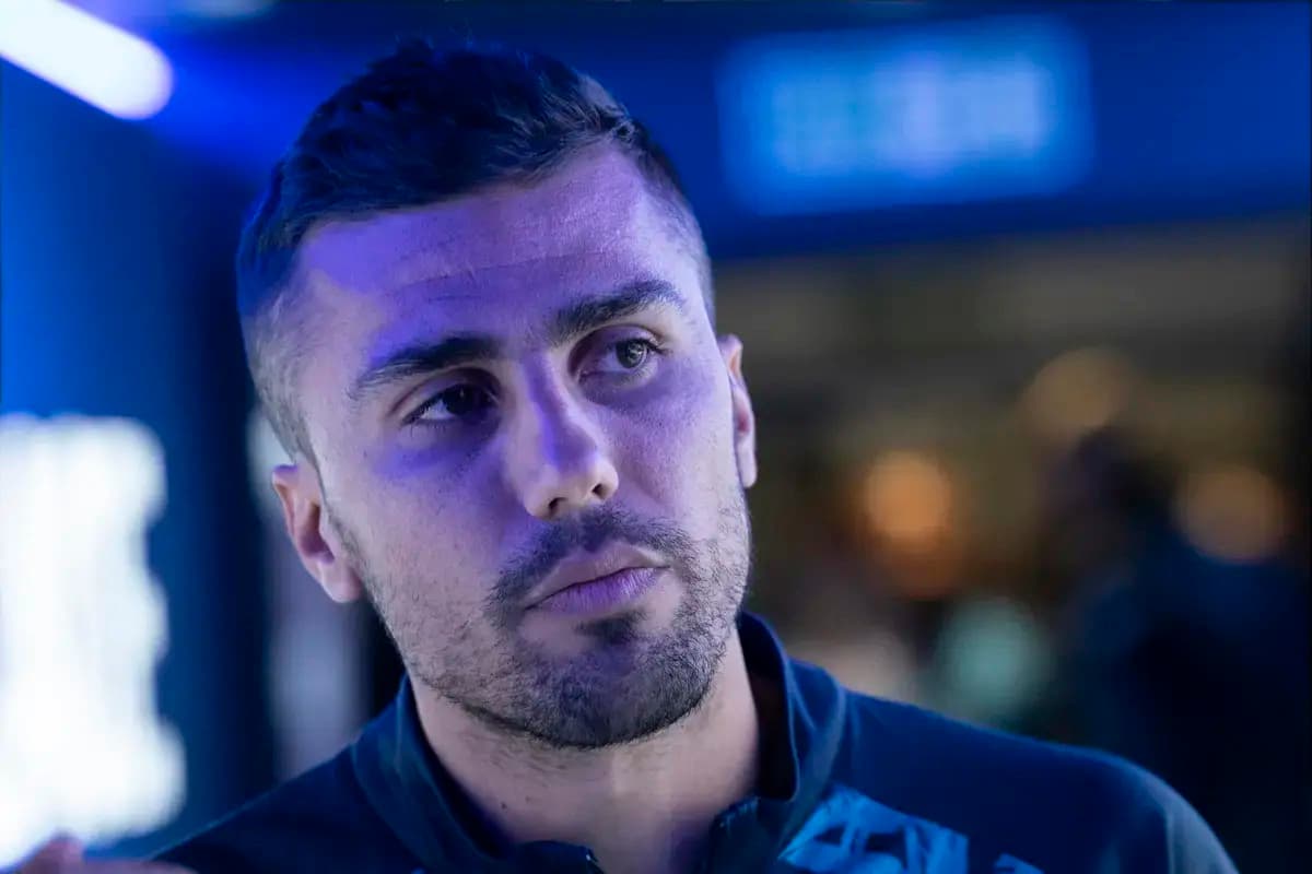 Athlete in blue lighting during an event