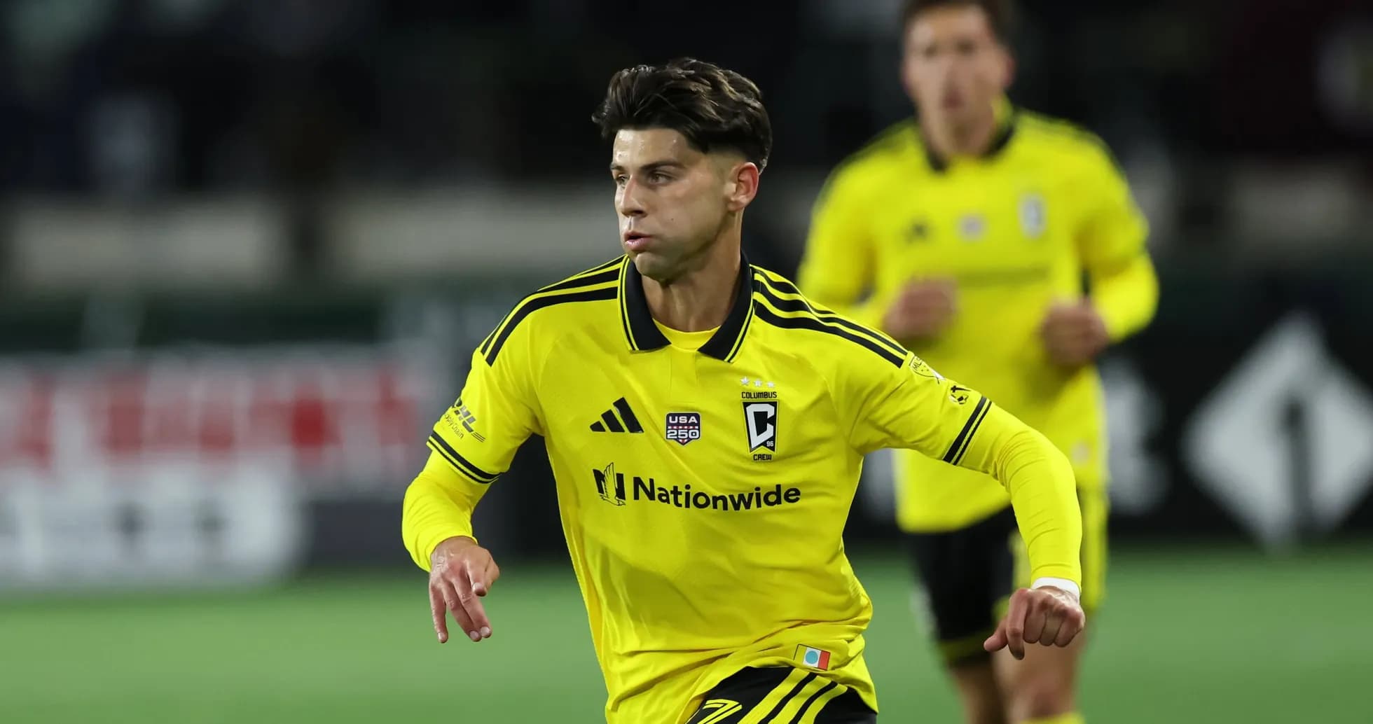 Columbus Crew player running during match