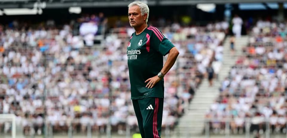 Coach observing the match from the sidelines