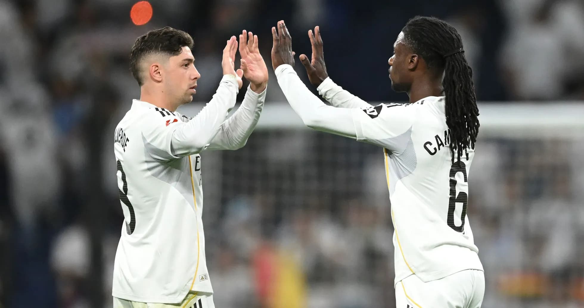 Two players celebrating during a match