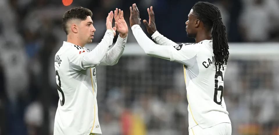 Two players celebrating during a match