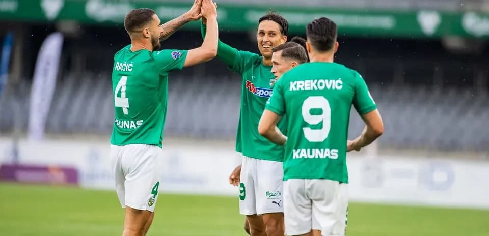 Players celebrating a goal during match