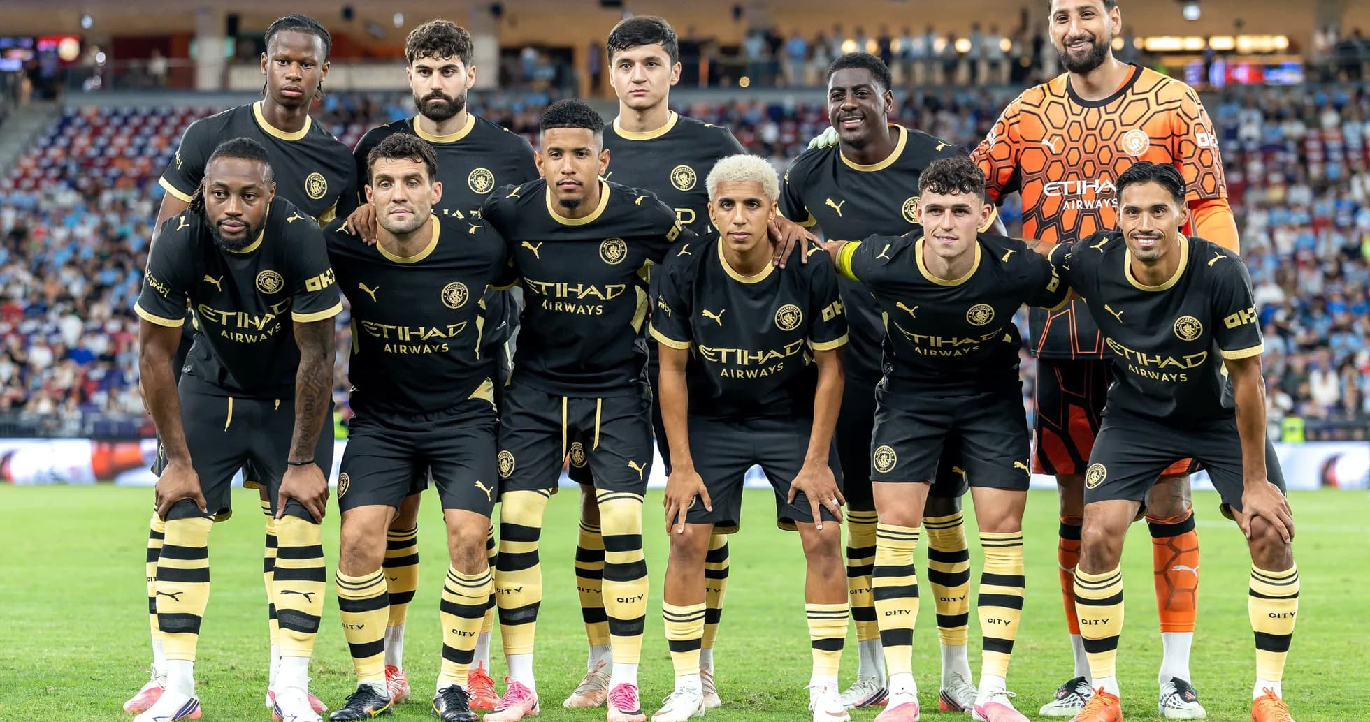 Soccer team posing for photo before a match