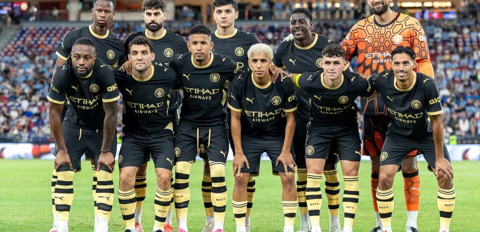 Soccer team posing for photo before a match