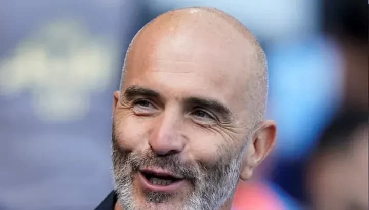 Coach speaking during a pre-match event