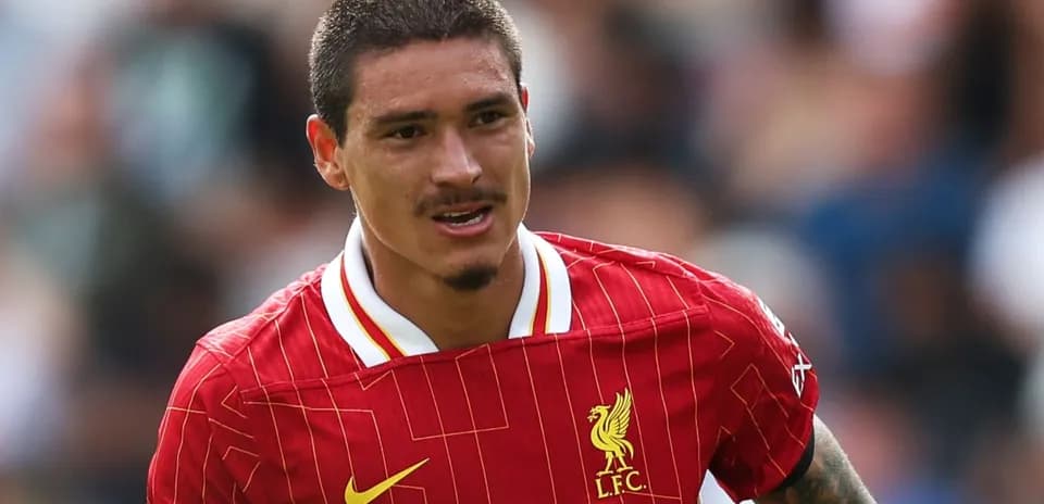 Player wearing Liverpool jersey during a match