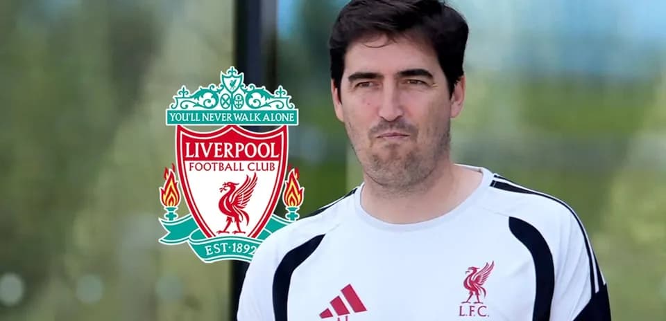 Coach wearing Liverpool FC training gear