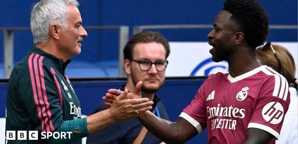 Coach and player shaking hands after match