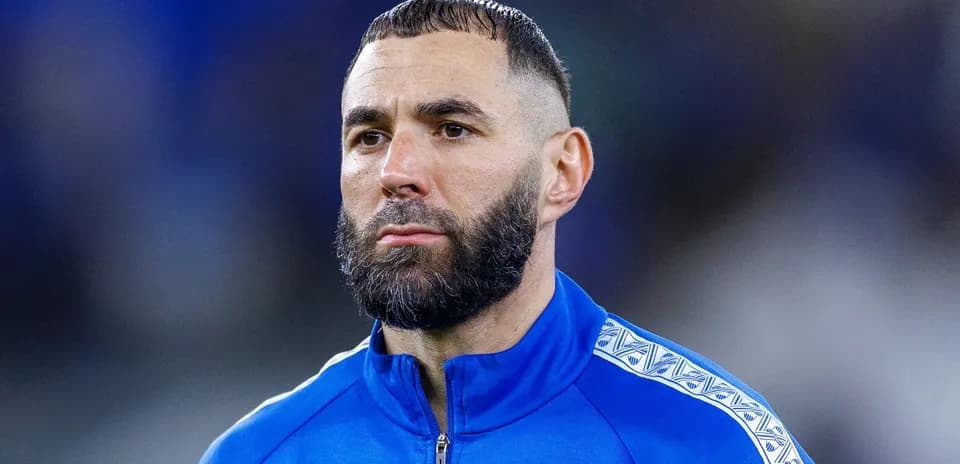 Player in blue tracksuit on the field