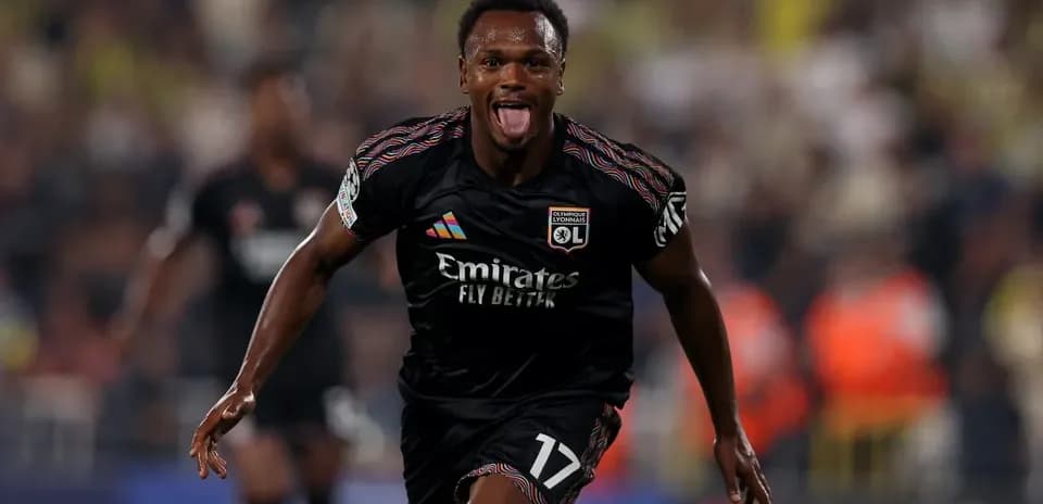 Lyon player celebrating during UEFA Champions League match