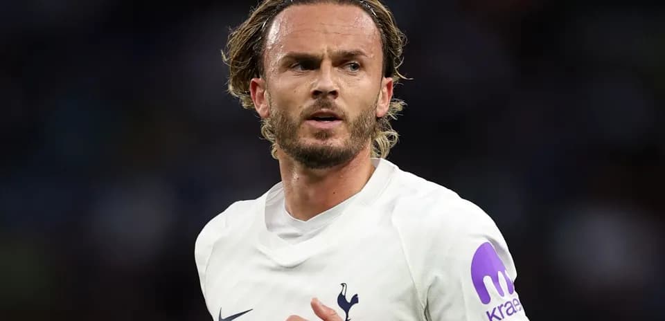 Player in Tottenham jersey during match action