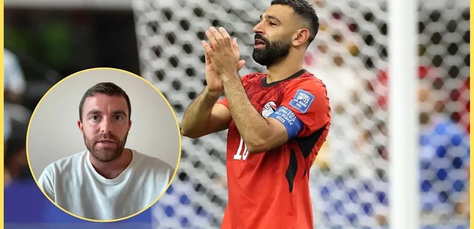 Player applauding after match in Egypt kit