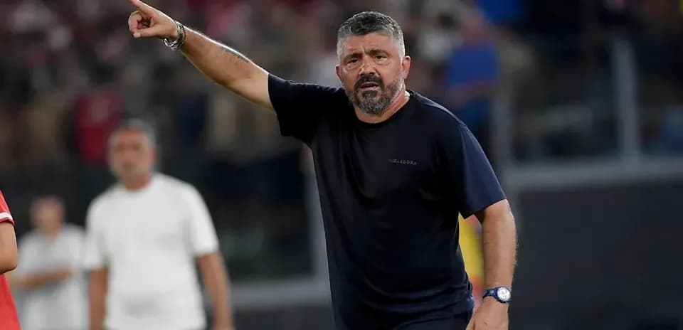 Coach gesturing during a match on the sidelines
