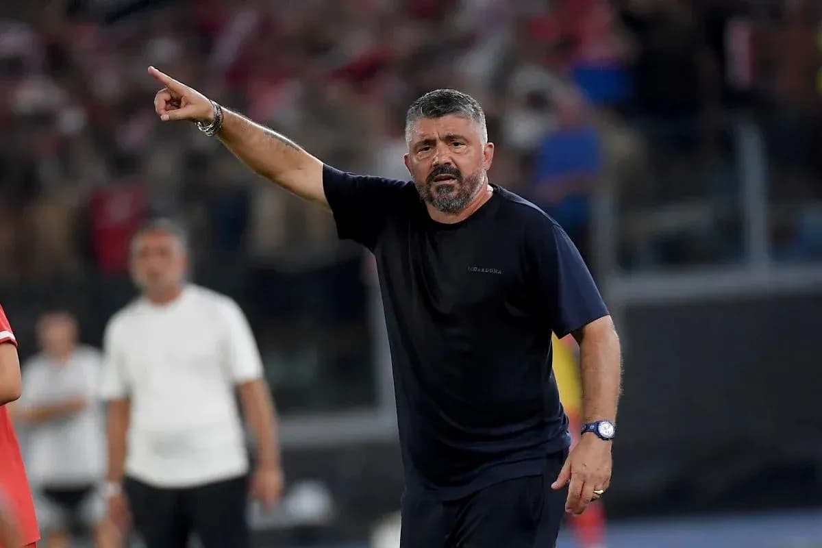 Coach gesturing during a match on the sidelines