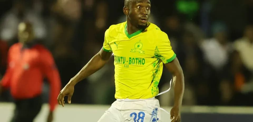 Player in yellow jersey running on the field
