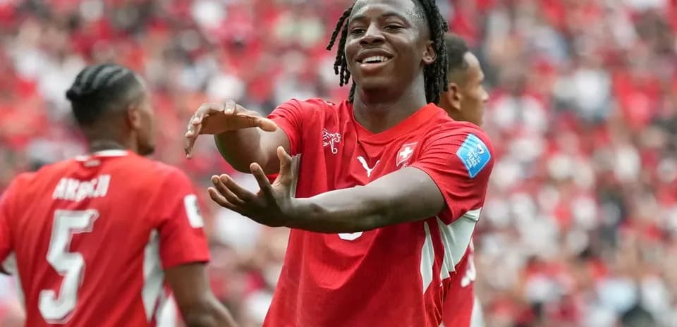 Swiss player celebrating a goal during match