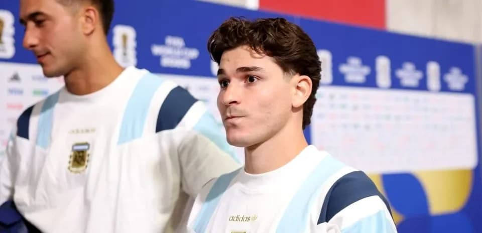 Two players in Argentina team uniforms before match
