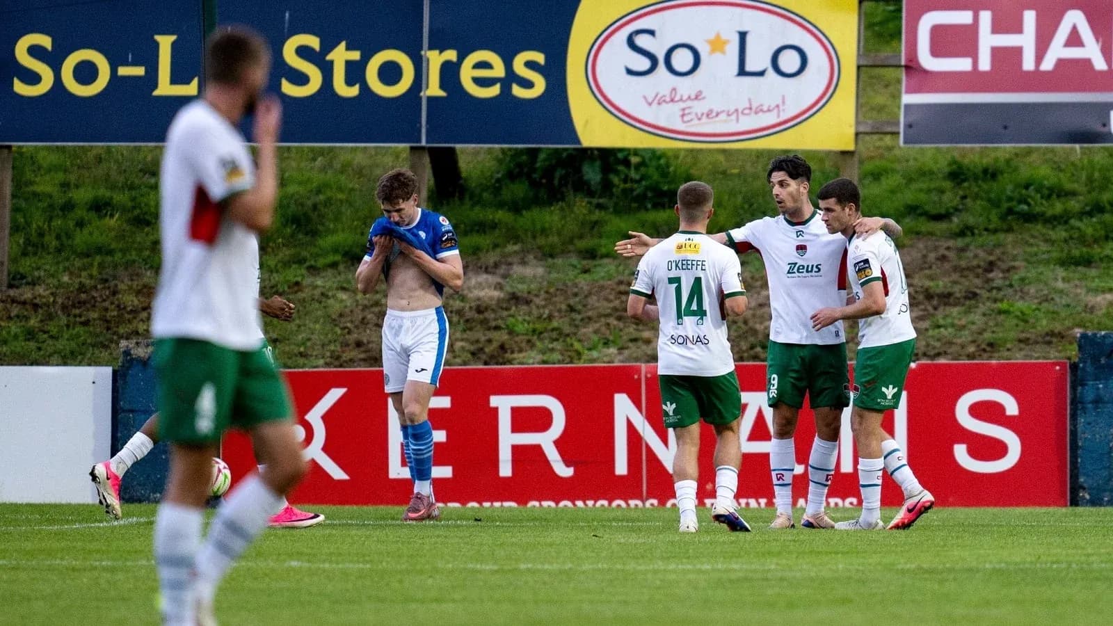 Players celebrating a goal during football match