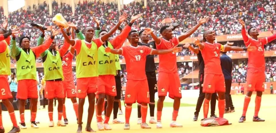 Team celebrating with fans after a match