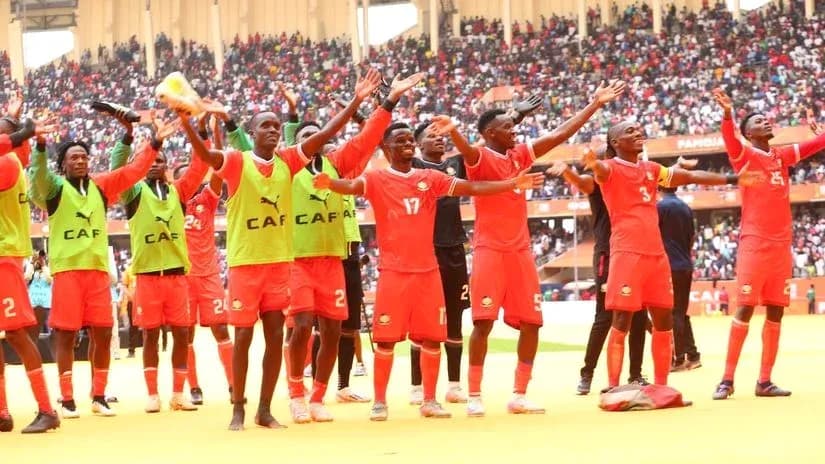 Team celebrating with fans after a match