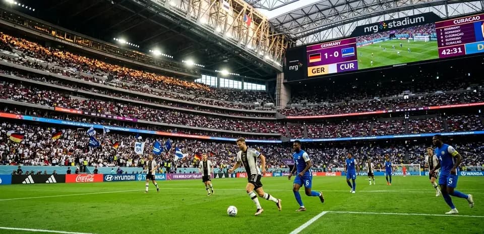Germany player dribbling during World Cup match