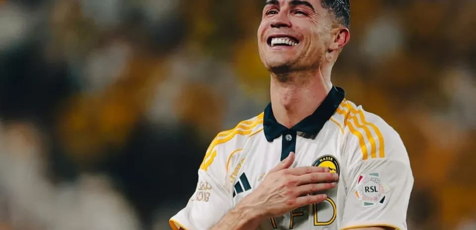 Player celebrating with hand on heart after match