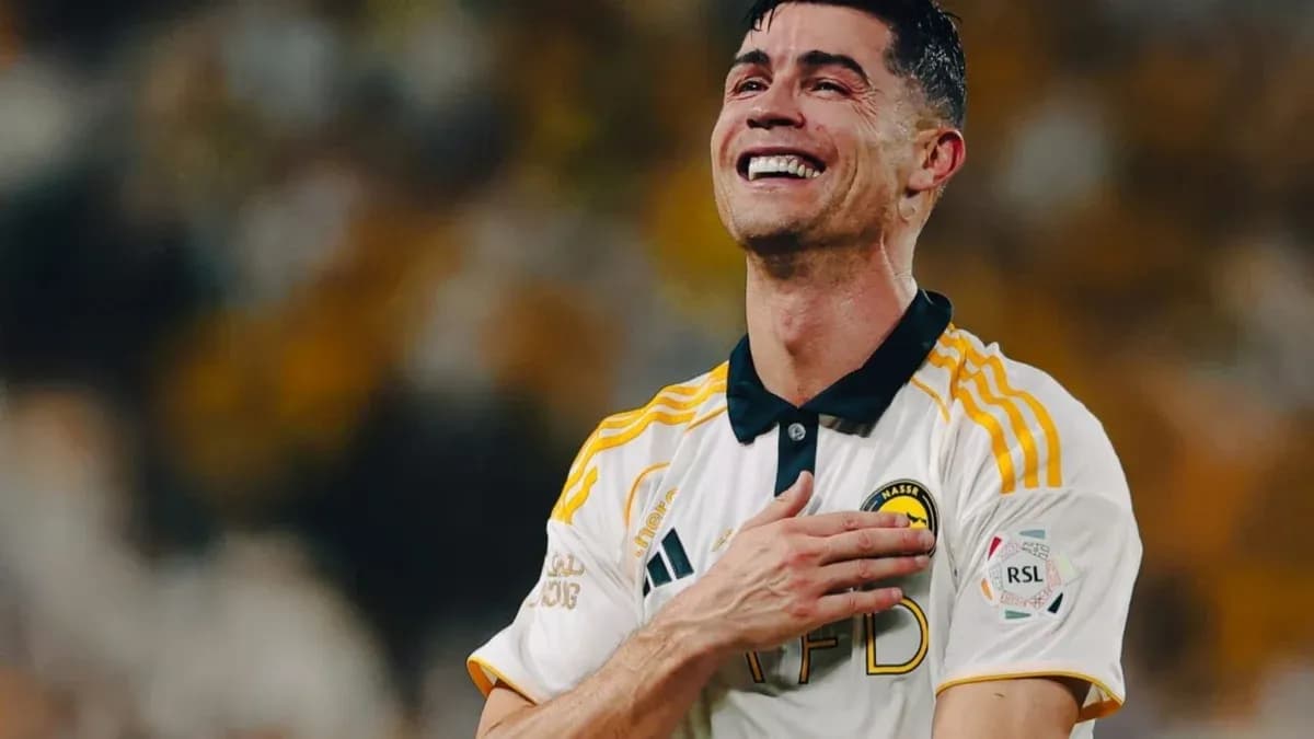Player celebrating with hand on heart after match