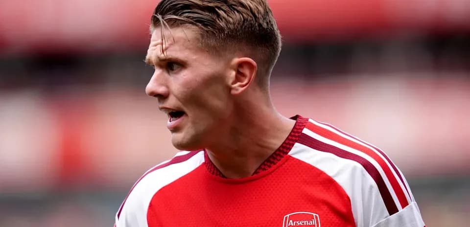 Arsenal player during match with focused expression