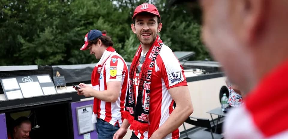 Fans in Stoke City shirts at event
