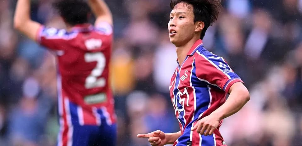 Player celebrating a goal on the field