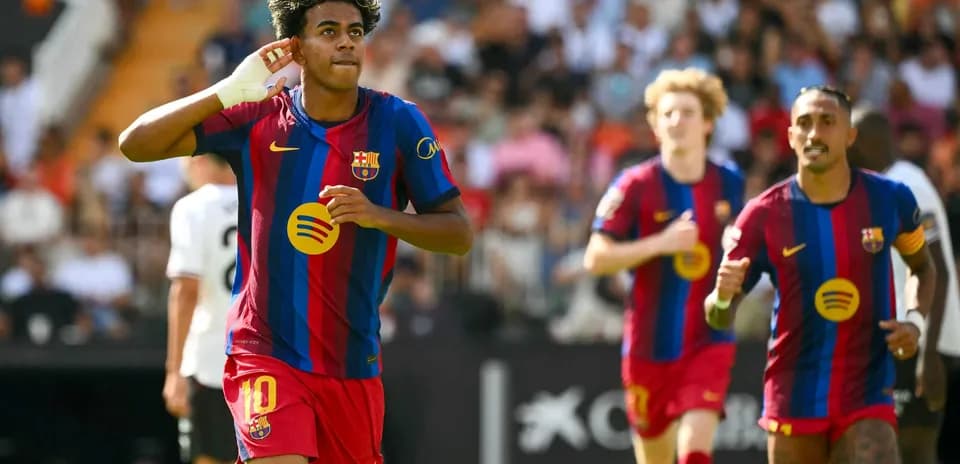 Barcelona players celebrating a goal during match
