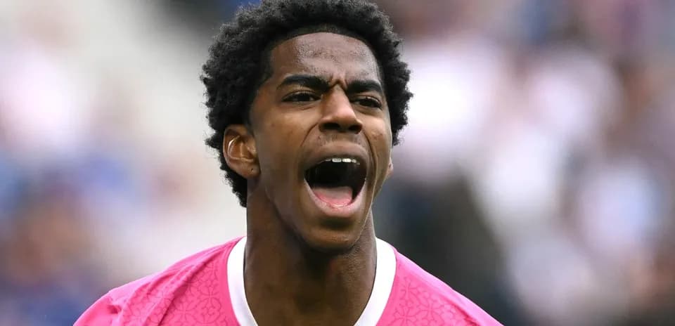 Player shouting during a football match celebration