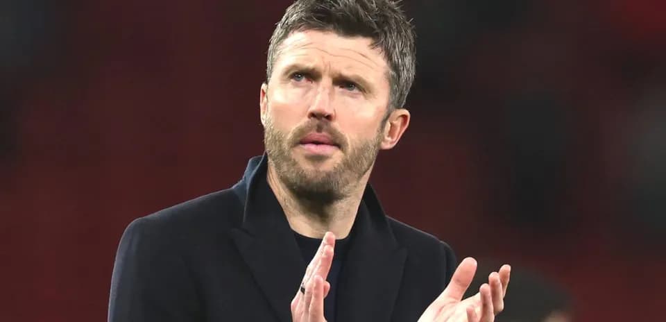 Coach applauding on the sidelines during match