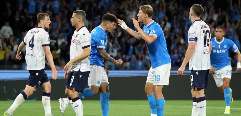 Napoli players celebrating during a match against Bologna
