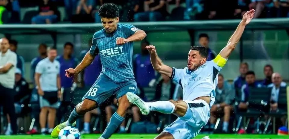 Player tackling during Slovan Bratislava match