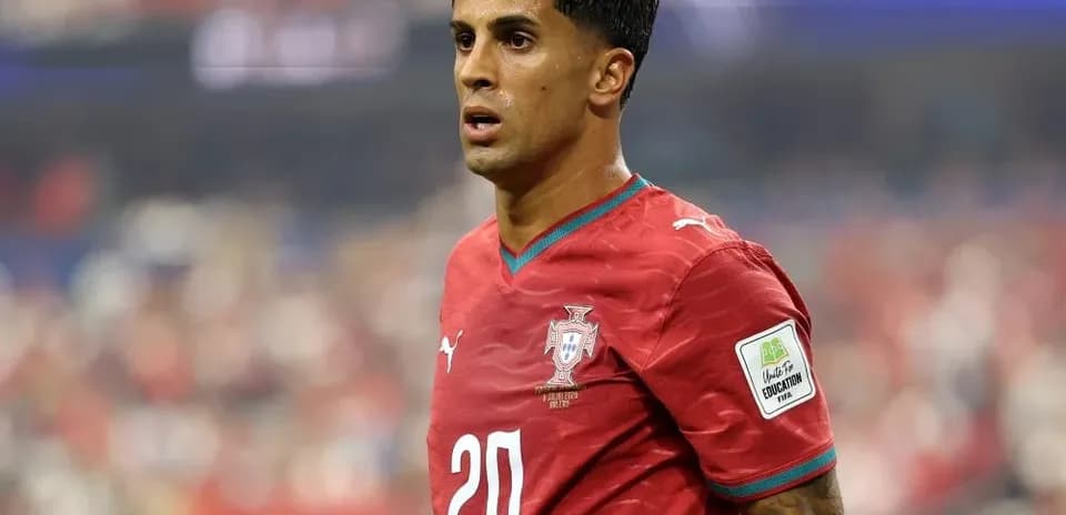 Player in red jersey during match action