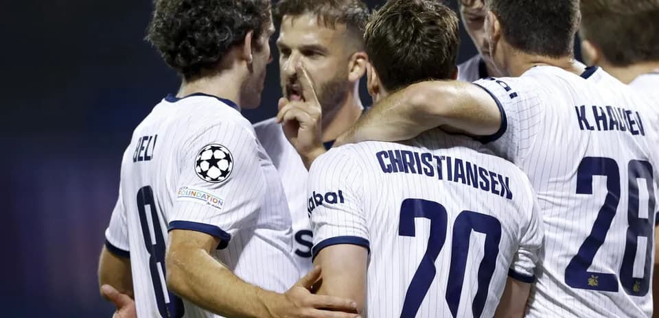 Players celebrating during UEFA Champions League match
