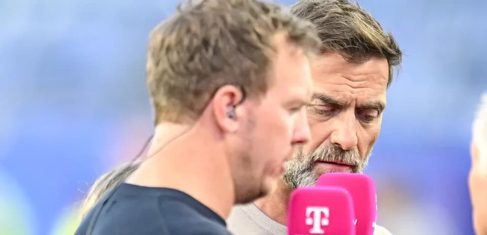 Two commentators discussing before a sports event