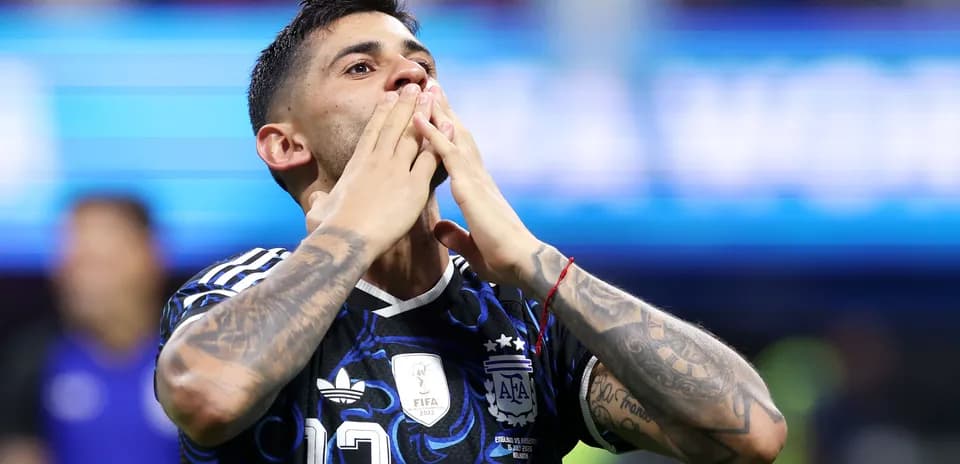 Player celebrating after a match, wearing Argentina jersey